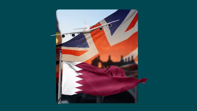 Qatar and UK flags